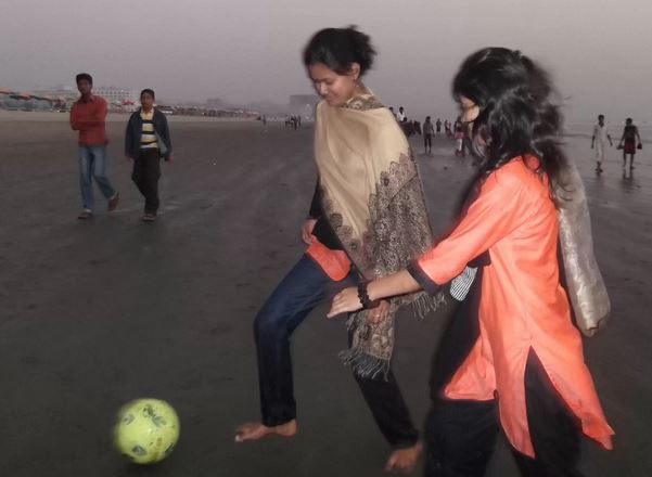 Coxs bazar sea beach football playing 